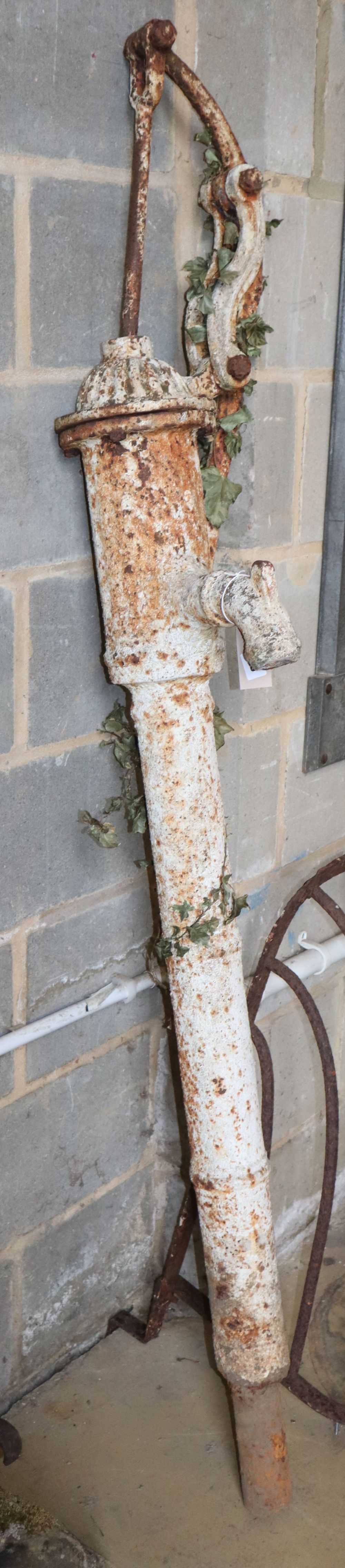 A cast iron garden water pump